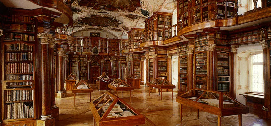 The library of the Abbey of St. Gall — rows of bound volumes from many traditions